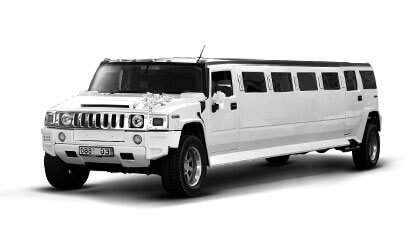 White stretch Hummer limousine decorated with bows, viewed from the front left, on a plain white background.